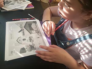 girl coloring Grain Bin Safety Week page